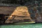 USA, Michigan, Pictured Rocks National Lakeshore. Mineral stains on sandstone cliffs. Art Print